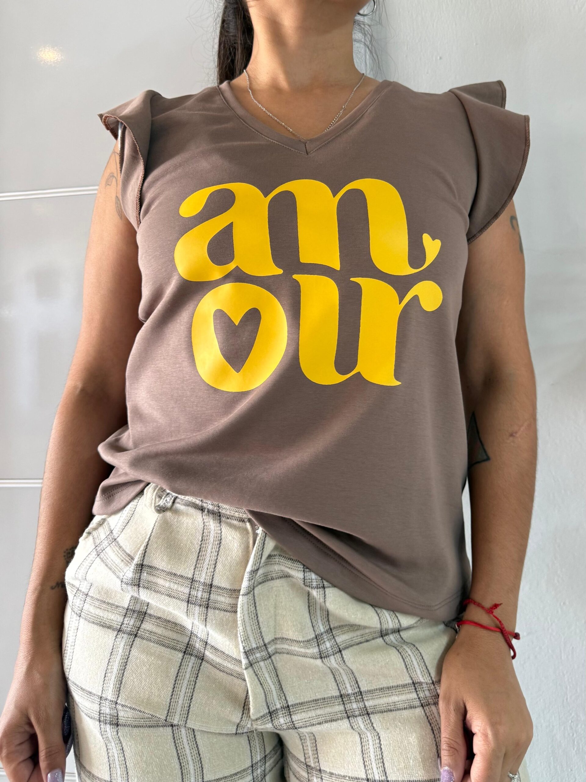 Musculosa ewa vison amour amarillo