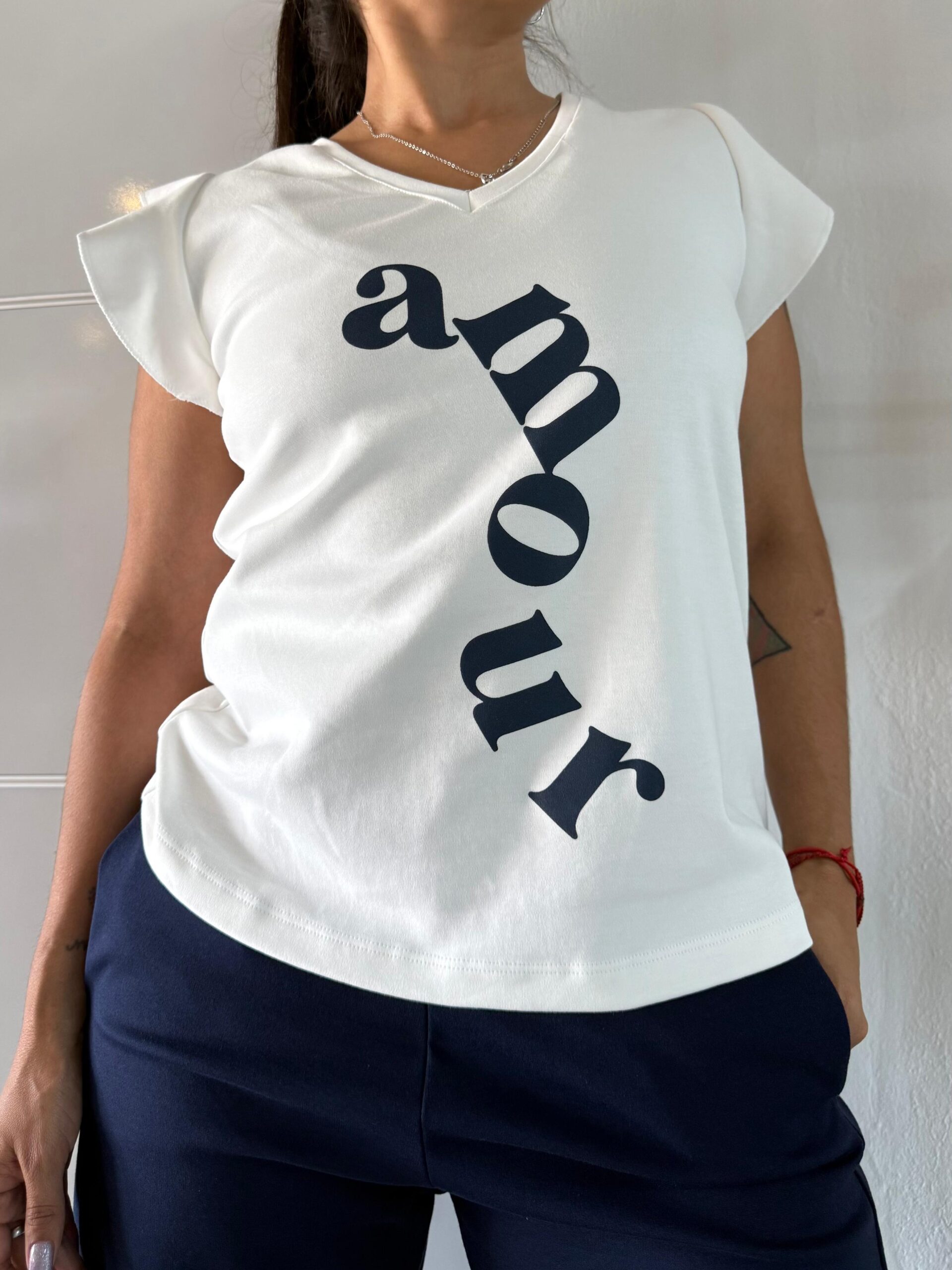 Musculosa ewa off white amour marino