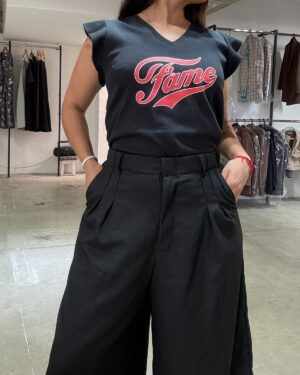 Pantalon okinawa sastrero negro detalle hilos plata